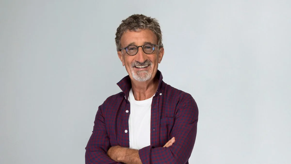 showing the image of "Eddie Jordan ", one of the most richest sportsmen in the world.